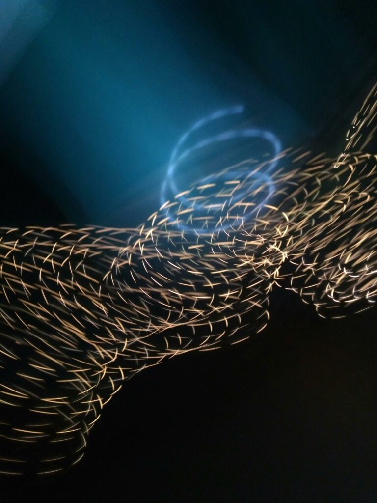 Stunning abstract light painting showcasing vibrant motion and fluidity.