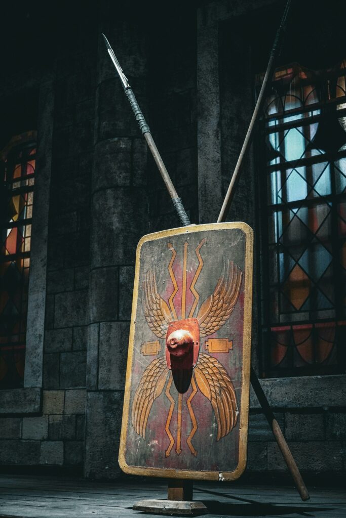 Roman shield and spears displayed at historical site in Istanbul, Türkiye.
