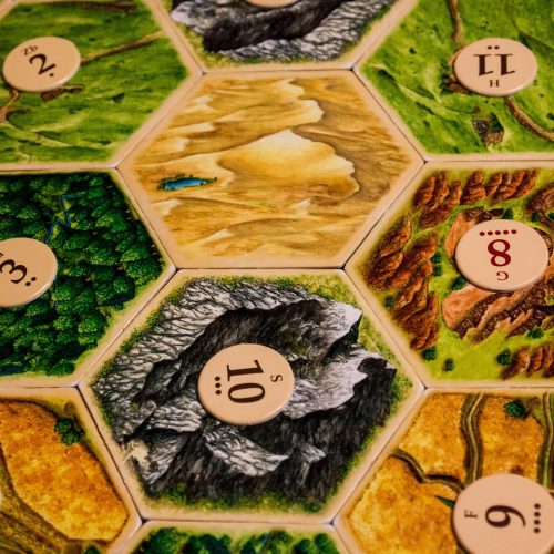 board game, settlers of catan, game, pieces, table, numbers, hexagon, shape, competition, strategy, play, intelligence, entertainment, challenge, leisure, dice, history, table game, board game, board game, board game, board game, board game, settlers of catan, hexagon, hexagon