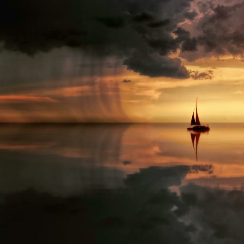 A striking seascape featuring a sailboat, lightning, and storm clouds at sunset.